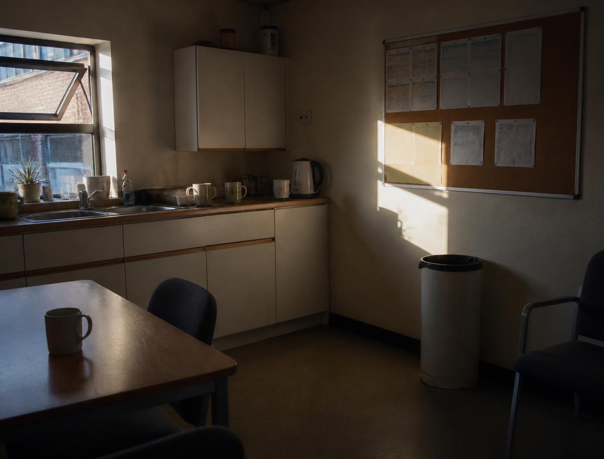 A quiet staff break area in warm morning light